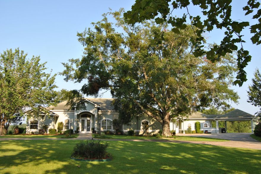 Beautiful, custom built home situated on six acres..lovely views of surrounding landscape.  Easy drive from 231...home has a mother-in-law suite with full kitchen..large kitchen area is great for entertaining; formal dining room and separate breakfast room; formal living room and separate family room; swimming pool with hot tub inside a screen enclosure..so much to enjoy!