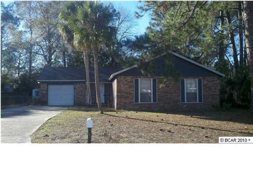 Great location for access to 23rd St. and St Andrews Blvd. This brick home has added square footage due to the enclosed garage. The living area has a brick fireplace and French doors leading to the large screened porch/sunroom. Additional storage building is already in place. Tile flooring throughout the home and a laundry room large enough for additional storage.