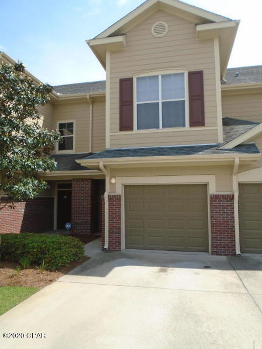 This 3/2.5 townhome offers an open living room/kitchen, hardwood floors downstairs, 9' ceilings throughout, spacious floor plan, screened in back porch, and large walk-in closets. The kitchen features black appliances and black tile granite. The master bath has a double vanity sink and large walk in closet; with a separate laundry room nearby, 2 bedrooms and bath complete the upstairs. There is a large one-car garage for parking. All this and in a gated community, close to the mall, restaurants, theaters and hospitals. The complex has a large club house and a pool!