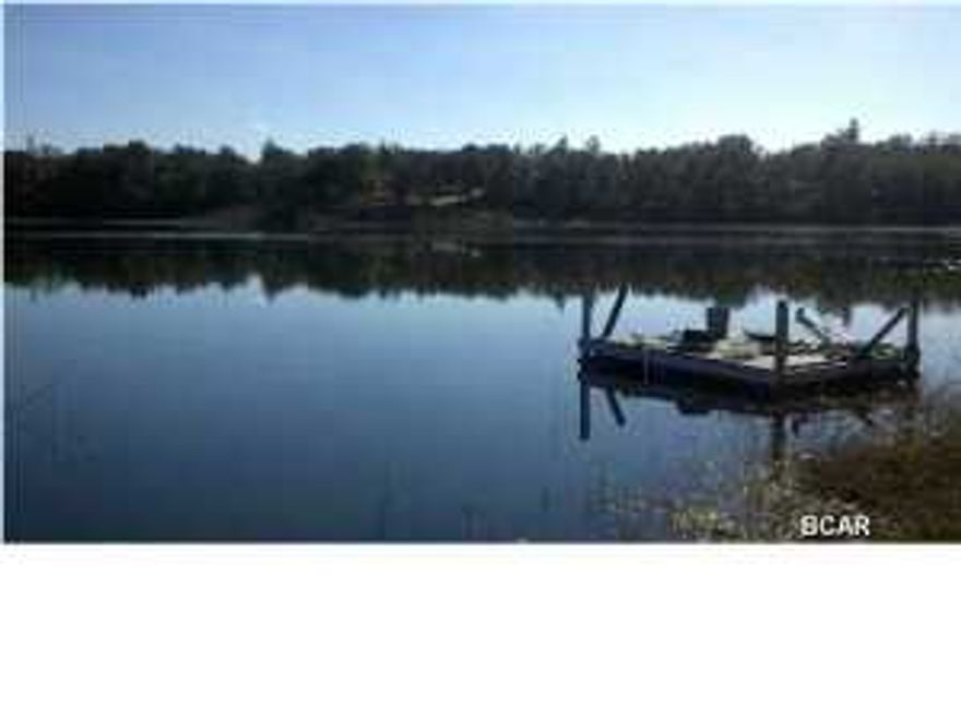 Beautiful waterfront property with large oaks. Fishing, kayaking, paddleboat, horseback riding, this is beautiful property that you must go see. Mobile homes allowed.