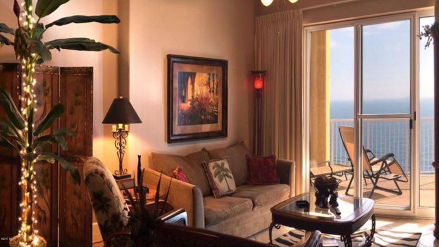 Absolutely stunning 2 bedroom gulf front condo.  The views from this condo and balcony are fantastic.  Beautifully decorated through out.  There's plenty of room on the over sized balcony.  The beautiful arched balcony can only be found in a few resorts.  Onsite  HOA office and rental company to accommodate your guests.  Close to restaurants and shopping.  Call today for your opportunity to view this gem.