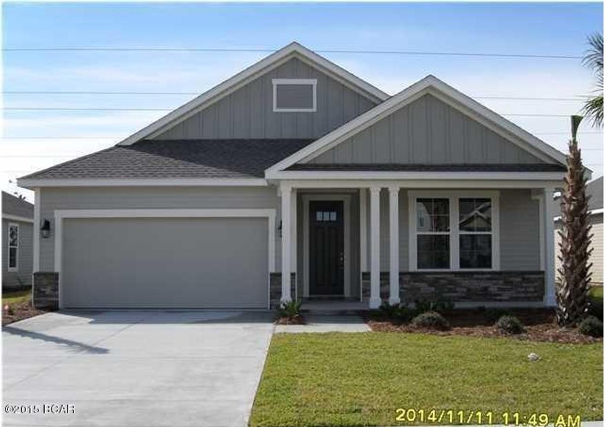 This house is a new construction Model Home Example and not the actual house being built. This home has a Bonita Floor Plan with a Carolina Elevation. A Samuel Taylor built home includes standard features such as designer carpet in main areas and bedrooms, 8 ft. 2 panel craftsman interior door package, brushed nickel fixtures and faucets throughout, insulated (R19) interior common walls and insulated (R38) ceilings, and durable Sherwin Williams premium interior wall paint. Kitchen features stainless steel appliance package (range, dishwasher, & microwave) and oversized 36'' wood cabinetry with crown molding, and granite counter tops. Full bathrooms include raised vanity heights, large tile flooring in bathrooms and laundry rooms, 2 x 6 Exterior Wall Construction, and hurricane tie down rod anchor system. Exterior of home includes coastal and craftsman architecture, spacious 2 car garage, architectural roof shingles with an extended warranty, low maintenance aluminum fascia and vinyl soffits, termite treated foundation, Hardi-Plank siding with an extended warranty, and durable Sherwin Williams Loxon exterior paint. All new construction homes are backed by a 2-10 Home Buyers Warranty. Your HOA dues includes lawn maintenance for the home. The Whisper Dunes subdivision includes sidewalks, curb & gutter, a beautiful community pool and pool cabana. Whisper Dunes is a golf cart friendly community and you are within a short driving distance to our beautiful beaches, Pier Park shopping, NW FL Beaches International Airport, and the beautiful 30A South Walton area. Choose your lot, floor plan & elevation, choose your design options, and pick your paint colors! All measurements and sizes are approximate, please measure for accuracy and verify all sizes.