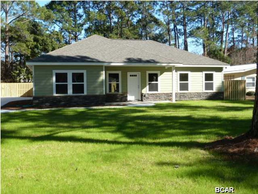 Beautiful 3 bedroom 2 bath split plan single story featuring over 1,500 square feet of heated and cooled living space.  All of the bedrooms have plush upgraded carpet all of the other areas have tile. The Master Bedroom has a large walk in closet, the Master Bath has dual vanities and a large walk in shower. Trayed ceilings in the Master Bedroom and Great room are a nice addition.  All of the kitchen appliances including the refrigerator are stainless, beautiful hardwood cabinets and granite countertops.  Hardi Board siding and a metal roof help to minimize the exterior maintenance on this home.  Minutes to the Beach, the Navy Base, shopping and entertainment.