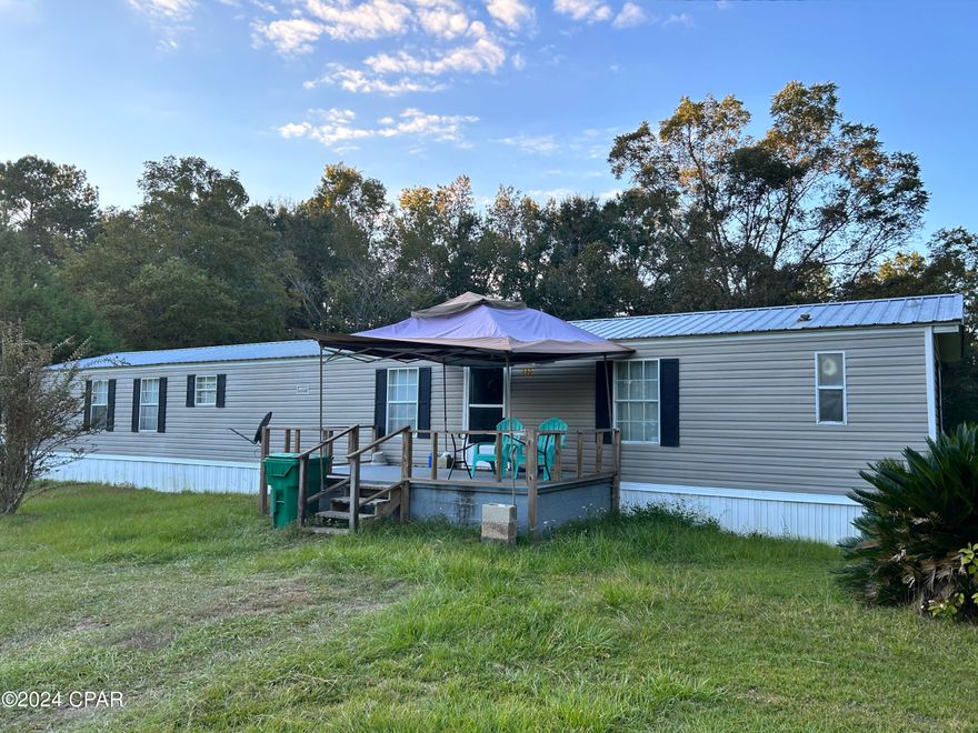 A little taste of country right on the edge of town.  Beautiful, spacious home on a secluded 1 acre lot.  Home features a large walk-in closet in the master bedroom.  Master bath boasts a large garden tub with separate walk-in shower.  This home is an absolute must see! Home is currently occupied by tenants and can be used for a rental income producing property.  Removable awning on front porch will not convey with property.