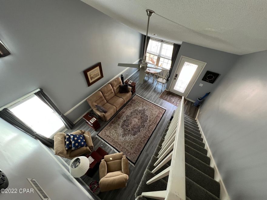 Raise your hand if you dream of owning a beautiful 2BR/2BA condo within a very short walk to the beach, not to mention several upgrades!  This unit is owner occupied and has not been rented, although it would make a great rental.  It is located within the sought-after gated community of Horizon South on the West-End of Panama City Beach including a deeded beach access. This courtyard, loft-style unit in immaculate condition. The downstairs living & dining area is open with natural light.  The master-suite upstairs has a great walk-in closet plus additional closet & full bath. There is also a bedroom downstairs, currently set up as a family room. The amenities include; 4 pools, hot tub, mini-golf, tennis, basketball, shuffleboard, etc. Measurements are approx. & should be verified.