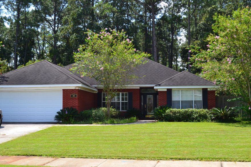 Solid all brick, contemporary construction in one of Lynn Haven's most desirable neighborhoods, The Landings. This 3 bedroom 2 bath home was built with quality and livability in mind. The interior is very open with hardwood floors in the living room and dining room and tile in the kitchen and baths. A fireplace is the focal point of the living room. The kitchen has an abundant amount of solid maple cabinets topped with stylish counter tops and complimented with a generous appliance package.  The master suite is HUGE and features a master bath with double vanities, separate tub/shower and a walk in closet.  Both bedrooms 2 and 3 are spacious and share a full bath. This home has a great layout and will fit the largest of furniture.  Call today for a private viewing