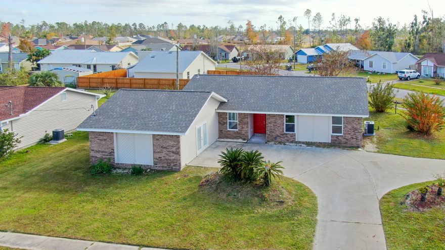 LARGE MOVE-IN READY HOME IN CENTRAL LYNN HAVEN! SIDEWALK COMMUNITY! The interior of this home features 4 bedrooms (OR 3 bedrooms with a bonus Living Room), 2 bathrooms, an open floor plan (good for entertaining), an XL interior laundry room, fresh interior paint, new vinyl plank floors (no carpet), a new water heater, and ample natural light. The kitchen boasts ample counter and cabinet space, new stainless steel appliances and is open to the dining area. The master bedroom can accommodate King Size Furniture. The exterior features a corner lot with circle driveway, a small back deck, and a new roof. This home is a short drive to restaurants, schools, shopping and more. NO HOA. X Flood Zone. Call today for a private preview. Measurements approximate.