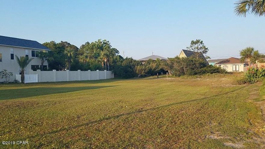 Extremely Rare lot located in a gated community on the far West End of PC Beach. Located just 5 minutes from the shops at 30Avenue, Jamaican Lake consists of only 45 lots situated on a single street that spans between Front Beach and Back Beach Roads. This lot is the 4th back from Front Beach Road and is only a 90 second walk to the crystal white sand at Access 95. This lot is the only Jamaican Lake lot currently available NOT in a FEMA flood zone. It is cleared and ready for your new home!