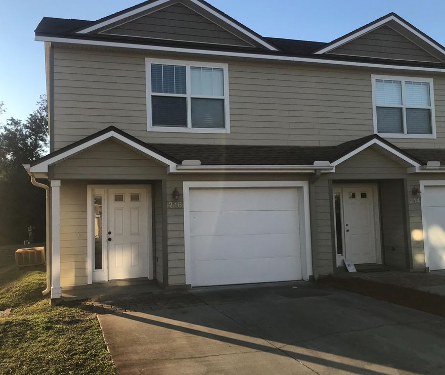 Callaway Chase Town-homes, close to shopping, restaurants, Tyndall AFB and all recreational activities that Panama City has to offer. This freshly painted and carpeted town home is in a well sought after subdivision. The first floor features the kitchen and living room space combination with tile floors and french doors leading to the back yard. Downstairs also features a 1/2 bath, under stairs storage closet, and a 1 car garage with automatic opener. Upstairs consists of a large master bedroom with walk in closet and private bath, 2 nice size additional bedrooms along with a full sized bath with hall entrance. Plenty of natural light and neutral colors through. All measurements are approximate and should be verified if important. Outside wall needs minor repair, waiting on contractor.