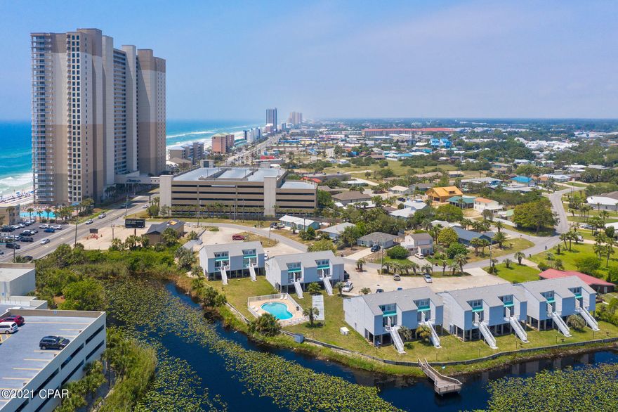 CURRENTLY UNDER CONTRACT, SELLER ACCEPTING BACKUP OFFERS SHORT TERM RENTALS ALLOWED!! This unit is ground level, walking distance to the beach, restaurants and 5 min bike ride to Pier Park!  This remodeled unit offers all new appliances, new counter tops, High end LVP floors with Tyle in the Kitchen, hall and bathroom, fresh paint, renovated bathroom and you cant beat the view! This ground floor unit would make a great second home to come visit, short term or long term rental. this complex has a large pool overlooking the lake, Being sold furnished, most items convey.