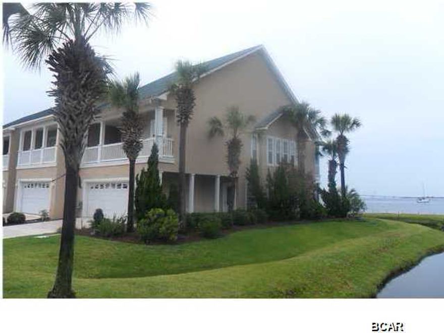 FANTASTIC BAY FRONT TOWNHOUSE RARELY AVAILABLE * OPEN FLOOR PLAN * THE BAY CAN BE SEEN FROM THE KITCHEN DINING AND LIVING AREA * THE SCREENED PORCH IS WONDERFUL FOR WATCHING THE DOLPHINS AND BOATS * THERE IS A POWER ROOM ON THIS FIRST LEVEL * THE MASTER SUITE IS ON THE SECOND FLOOR AND IS FIT FOR A KING & QUEEN * THE BEDROOM HAS FRENCH DOORS TO A BALCONY OVERLOOKING THE BAY * HUGE MASTER BATH WITH JACUZZI TUB, SEPARATE SHOWER & TWO VANITIES * THE CLOSETS AND STORAGE ARE WONDERFUL * THE OTHER TWO BEDROOMS ARE LARGE WITH SEPARATE BATHROOMS * THIS UNIT IS IN EXCELLENT CONDITION WITH CARPET & TILE THAT LOOK NEW * PELICAN BAY OFFERS TWO PIERS, CLUBHOUSE, EXERCISE AREA, POOL, HOT TUB, AND WALKING TRAILS. WHAT A BEAUTIFUL HOME OR VACATION PLACE * BEAUTY & SOLITUDE!