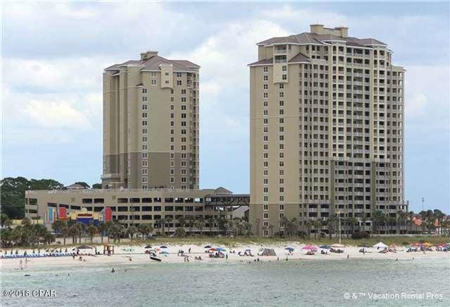 CURRENTLY UNDER CONTRACT, SELLER ACCEPTING BACKUP OFFERS Luxurious Gulf front living at one of the best resorts on the Beach on the 2nd floor ~ Grand Panama. The Gulf front Master Suite opens to the large balcony, also accessed by the living room with panoramic Gulf views. Many upgrades and decorator-perfect finishes including tile floors throughout unit except the bedrooms, granite counters, tile kitchen back splash, stainless steel appliances and beautiful furnishings.