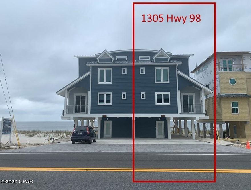 Located on the white sandy beaches of Mexico Beach, this four story newly remodeled home is everything a beach lover could dream of. The West half of building, with great views from every room and balcony along with five spacious bedrooms to sleep multiple families. Enjoy a beautiful view of the Gulf while relaxing in the large Soaker tub. An indoor elevator makes going from floor to floor a breeze. Brand new wood grained tile adorns the floor on every level. Kitchen is equipped with brand new appliances, cabinets, granite counter tops and a stainless steel farmhouse sink. Enjoy the sunset on the master bedroom's private balcony. The prime beach location and sleeping capacity make this home popular on the vacation rental market giving this home great income potential.