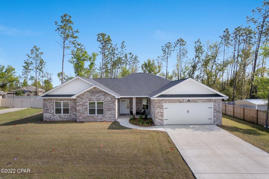 **CURRENTLY UNDER CONTRACT, SELLER ACCEPTING BACKUP OFFERS**Luxury Quality Craftsmanship with a cozy ''Home'' feel! NEW FLOOR PLAN- NEW CONSTRUCTION HOME by one of Bay Counties Best Residential Builders! Located on a 1/2 Acre Lot, Flood Zone X, No HOA Fees! 4 Spacious Bedrooms & 3.5 Baths, over 2,200 sq ft. This home has many Energy Efficient Features All LED Lights, Fully Insulated Interior Walls, Low E windows & much more. All thread rod system for Hurricane & strong wind protection. The Interior Features bullnose rounded wall corners, soft neutral Behr Premium paint wall color sure to match any decor, custom blinds, crown molding, tray ceilings in the Living room, Dining & Master Bedroom, recessed & upgraded light fixtures throughout, The Kitchen is spacious & beautiful with an over 9ft Island, custom cabinetry with many great features including, double built in trashcans, deep drawers for pots & pan storage, all stainless steel appliances included, 2 Pantries, All Energy Star Rated Stainless Steel Appliances & more! There is a spacious dining area with tray ceiling that adjoins the kitchen that can easily accommodate a large 6-8 seater table with hutch/buffet. The Master suite is very spacious & has a large master bath featuring his and her double quartz topped sink, elegant Soaker tub, separate 5ft shower w/ glass door, large walk-in closet & private potty area! The additional bedrooms are very spacious with 4x5 walk-in closets, The front additional bedroom features it's own private bathroom & Extra Large 7ft walk in Closet! There is also an additional Full bath with tub/shower combo & a 1/2 bath! The Laundry Room is spacious with storage cabinets & deep utility sink.
There is a spacious 2 car garage with attic storage w/pull down stairs, sprinkler system with Wireless RAIN-CLIK Sensor to auto shut off Irrigation System during rainy conditions. There is a covered front porch is & covered back porch, these areas make the perfect spot for relaxing or entertaining.
Make your appointment to view this lovely home today, it won't last long for sale! 1 year Builders Warranty & Fully Transferable Termite Bond Included! Builder is a VA Approved Builder! 
***All Measurements Approximate, Please Measure if needed***
