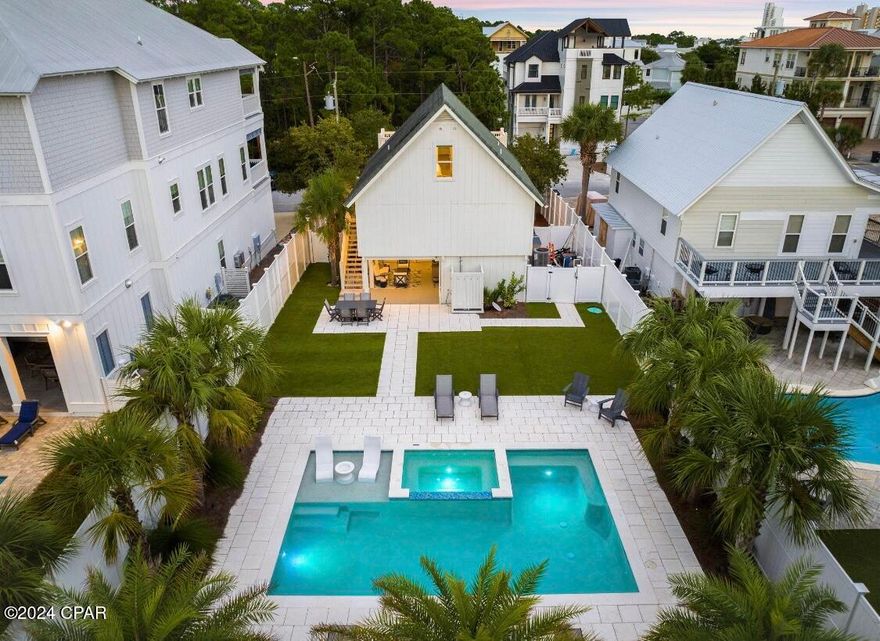 in the heart of Seagrove Beach on Santa Clara St. this stunning 4 bedroom 3 bathroom coastal retreat offers unparalleled lifestyle of sophistication and tranquility.