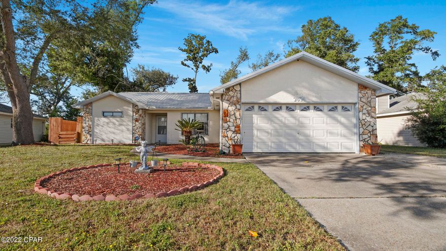 CURRENTLY UNDER CONTRACT, SELLER WILL CONSIDER BACKUP OFFERS - ATTRACTIVE HOME IN SHADOW BAY - NEAR TYNDALL AFB! The interior features 3 bedrooms, 2 baths, a semi-open split bedroom floor plan (great for entertaining), 2 dining areas (or use one for a 2nd living space), an interior laundry room & a 2 car garage. The living room has a vaulted ceiling, a wood burning fireplace and it peeps through to the kitchen. The master bedroom can accommodate king size furniture and has a walk-in closet. The exterior features a large back deck (perfect for grilling) and a privacy fenced-in backyard. Newer Updates: Roof, HVAC & gas water heater. This home is a short drive to restaurants, schools, shopping and more. NO HOA. Call today for a private preview. Measurements approximate.