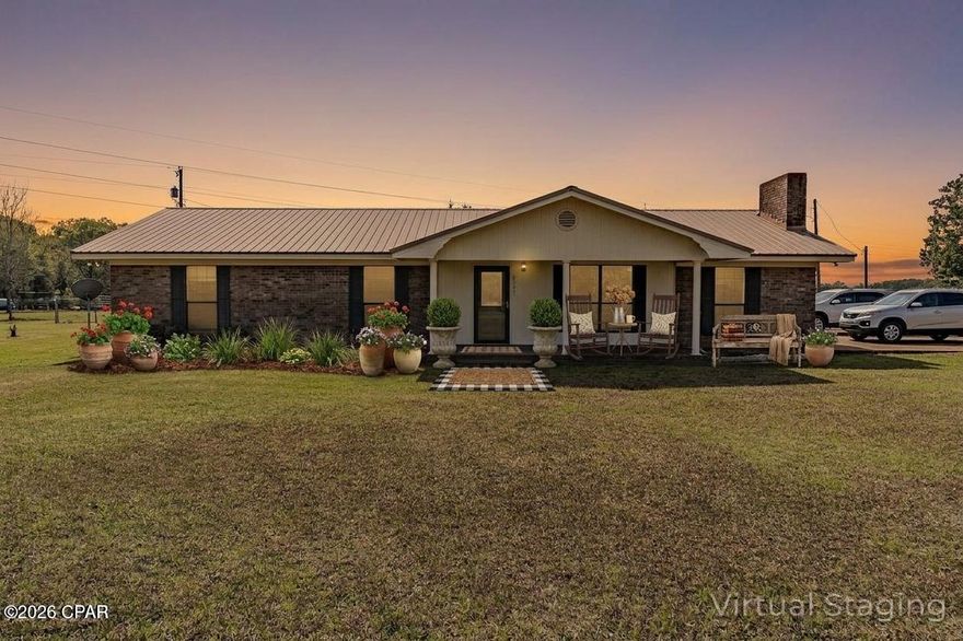 Country Brick Home on Over Two Acres with Modern Updates Nestled on over two acres in the country, this brick 4-bedroom, 2-bath home blends classic charm with contemporary comfort. Inside, a large living room with a cozy fireplace opens to a bright kitchen and dining area, creating a welcoming central hub for family life. Updates include new fixtures, flooring, and paint.  The bedroom closest to the dining room has its own private entrance and could serve as a den, office, game room, or guest suite. Both bathrooms have been updated, and the kitchen shines with stainless-steel appliances. A large fenced-in backyard provides ample space for outdoor activities. The home is in fantastic shape and ready for your family to make it their own. Some photos are virtually staged.