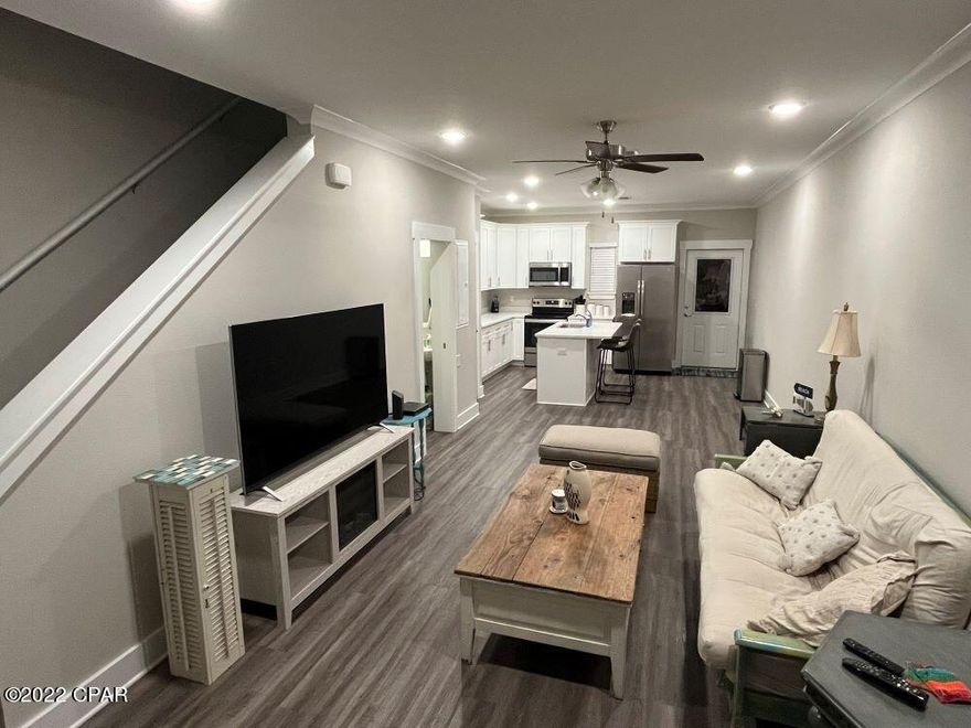 $259,900. PENDING CLOSING. This lovely townhome is LIKE-NEW, only 1.5 years old! Job change has forced owner to sell and relocate, so a new owner can take advantage of the savings and still have a basically new home. The 1,336 sq. ft. of living space includes 3 BR's, 2.5 baths, open living room and kitchen, and covered back porch. The living/kitchen area, as well as a laundry closet and half-bath, are all on the first floor; upstairs are 3 BR's and 2 bathrooms with ample closet space. The kitchen is equipped with dishwasher, refrigerator, stove, garbage disposal, and microwave. The home has electric CH&A, laminate vinyl plank floors (that look like wood) throughout the home, open back porch with storage closet, 2 parking spaces in front of the unit, and access to the community pool and common area. Location has a small-town country feel, while only a few minutes from the beach, shopping, and recreation. HOA fees are $385/quarter, or approximately $130/month. The Verandas Townhouses is a great place to live, work, play, or raise a family!  $259,900.  (THIS HOME IS NOT FOR RENT.)