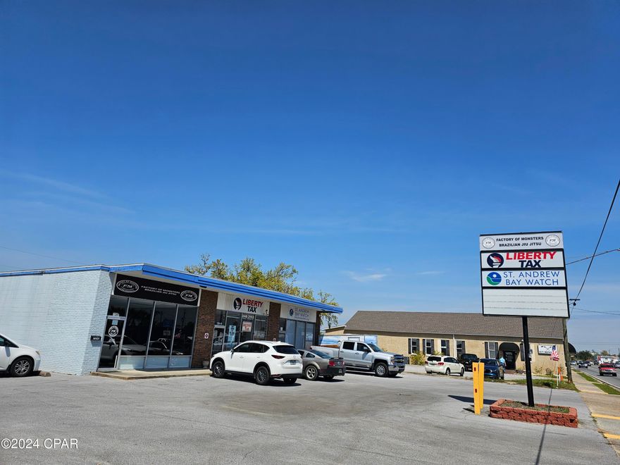 Location, location, location! Center of Lynn Haven Just passed the new Lynn Haven town hall on HWY 77 with heavy main traffic. This professional center already has established business with Liberty Tax service and a Real Estate firm. This location offers a end unit with lots of parking and signage. With 1200sqft of office space located in a fast and growing area to relocate your office or expand your business.