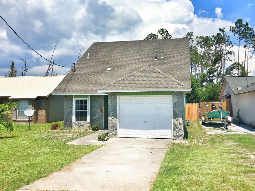 MOVE-IN READY & SO MUCH BETTER THAN NEW!  This wonderful Callaway home feels so light & bright w/ its high ceilings and open-concept living spaces. Everything is brand new, from the new roof to the vinyl plank flooring. The large kitchen boasts granite countertops, new stainless appliances, new white cabinets, beautiful tile backsplash, & a breakfast bar. Family Room area has a built-in Media Nook that can be closed off by charming Barn Doors. Downstairs Master Suite has his/her closets and a large soaker tub w/ tile surround & SHOWER TOWER. Upstairs two more bedrooms share a bath & a large Loft overlooking downstairs that would make an outstanding Study Area for kids or Home Office (or convert to 4th Bd). Great BIG back yard for kids & pets. Convenient to Tyndall AFB & EasternShipyard