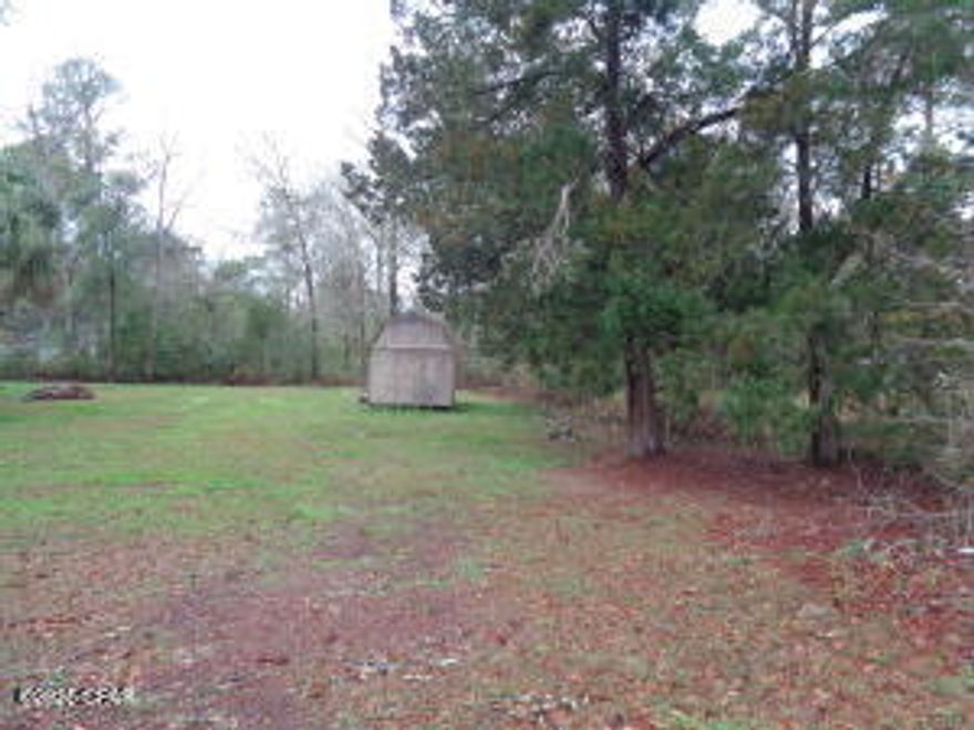 Nice lot located on paved road. Close to amenities. Lot is over .35 of acre. Build your dream home or Manufactured home with approval from City. The storage building does not convey with property.