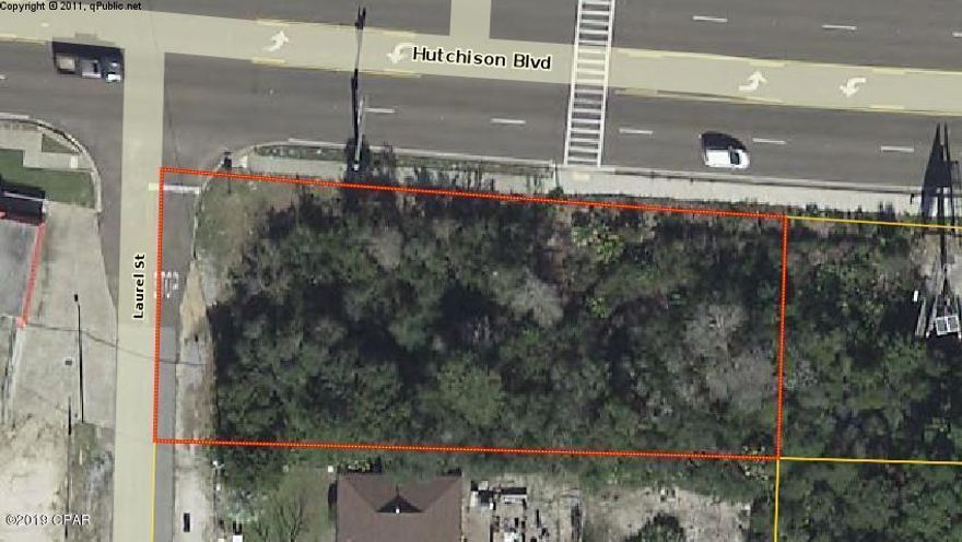 This commercial lot zoned High Intensity with lots of traffic is a great location for a small office or residential complex.