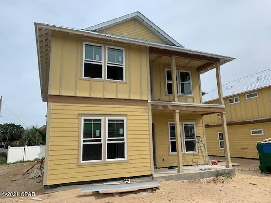 Beautiful new construction beach home, located on the much desired West End area of the beach. Home is situated just steps to the white sand beaches and is zoned for short term rental. The home includes a 12x24' pool with pavers around the pool area. There is also a 18'x7' covered patio that over looks the gorgeous pool area. This coastal home features a metal roof, hardie board siding, hurricane proof(high impact) windows, double eight foot French doors ,paver driveway, outdoor shower, and tankless gas hot water heater. Interior amenities include a gourmet kitchen with 42" white cabinets with quartz counter tops, gas oven/cook top and walk-in pantry. Stainless appliances including a French door refrigerator adorn the kitchen. There are six bedrooms, an open game room, four full baths and one half bath. Located close to Pier Park shopping ,restaurants and food stores and airport.