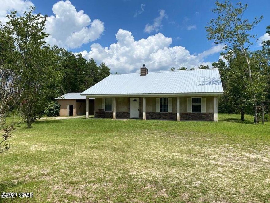 Great home in North Bay County located in Southport. This home sits on 3 acres of land (mostly maintained by the Landlord) to include a circular drive way, covered carport with enclosed storage building. This home features a split bedroom floor plan with cathedral ceiling in the living room with a wood burning stove, lvp flooring, and breakfast bar. Also features a separate office and sitting area.