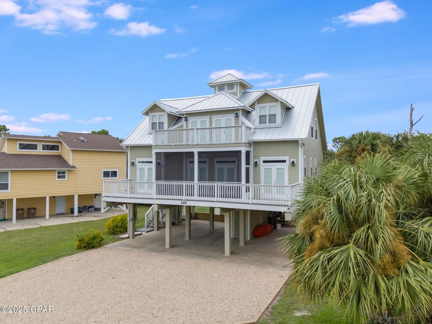 A Cape San Blas dream awaits. Discover the Florida coastal lifestyle you've always imagined at this stunning 4-bedroom home. Expansive windows frame protected Gulf views, while tranquil St. Joseph Bay vistas paint a serene backdrop for everyday living. Enjoy a seamless indoor-outdoor flow as your open-concept living area spills onto a private deck, the perfect spot for sipping morning coffee to the sound of crashing waves. This home was designed for both tranquil relaxation and memorable entertaining. Your coastal haven includes two elegant master suites, each with private balconies for a quiet escape. A convenient wet bar adds an extra touch of luxury for guests. Downstairs, two additional bedrooms offer comfortable accommodations after a day of sun-soaked adventures. With a dedicated beach access just steps away and a refreshing neighborhood pool nearby, you'll feel like you're on a permanent vacation. Many extra features such as brick paver entrance, concrete covered parking with ample space for cars, boat, and toys, outside elevator lift, propane Generac generator, outside elevator lift, multiple screened and covered porches and decks. Centrally located and only 10 minutes to Port St Joe and 20 minutes to Apalachicola for a variety of entertainment options. Please take a look at out 3-D matterport tour for more interactive details. Vacant and easy to show. Some dimensions were obtained via the Gulf County Property Appraiser's Office, Please verify if important.