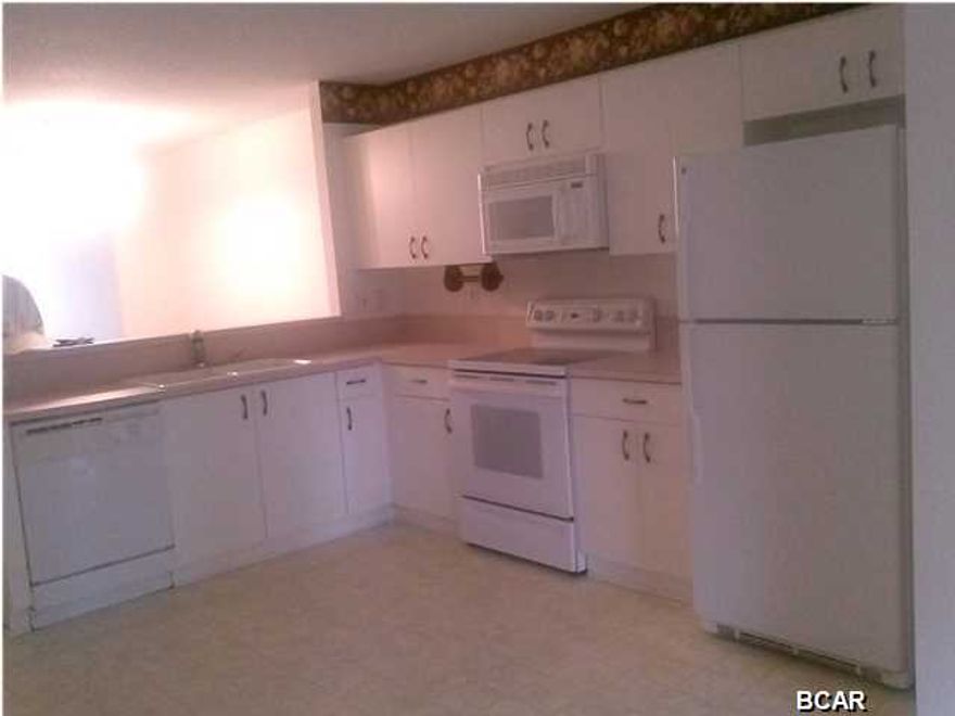 This is a perfect starter home. Master Bedroom contains walk-in closet plus an additional closet. Screened in back porch has carpet and has a great view of the water. Kitchen contains Washer/Dryer closet and a pantry. This is a great floor plan with no wasted space.