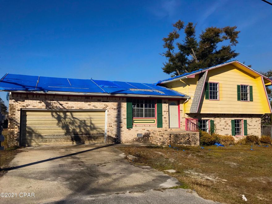 AMAZING fix & flip or investment opportunity with this 4 Bedroom / 3 Bath home in Panama City! Located in the wonderful Lakewood neighborhood and close to Callaway shopping and Tyndall AFB, this 2-Story 'split-level' home is 1,732 sqft. (heated) and 2,240 sqft. (total), that includes a Bonus Room, Basement and 2-Car Garage. The home sits on a large corner lot with a huge fenced-in backyard, and includes a nice shed. The exterior of the home is a combination of brick, stucco and hardie plank. The home was damaged by Hurricane Michael and will require repairs; it is currently gutted on the inside and ready for rehab. It is also on public water and sewer, and NOT in a flood zone. At this price, this home is a STEAL and WILL NOT LAST LONG - So act quickly!