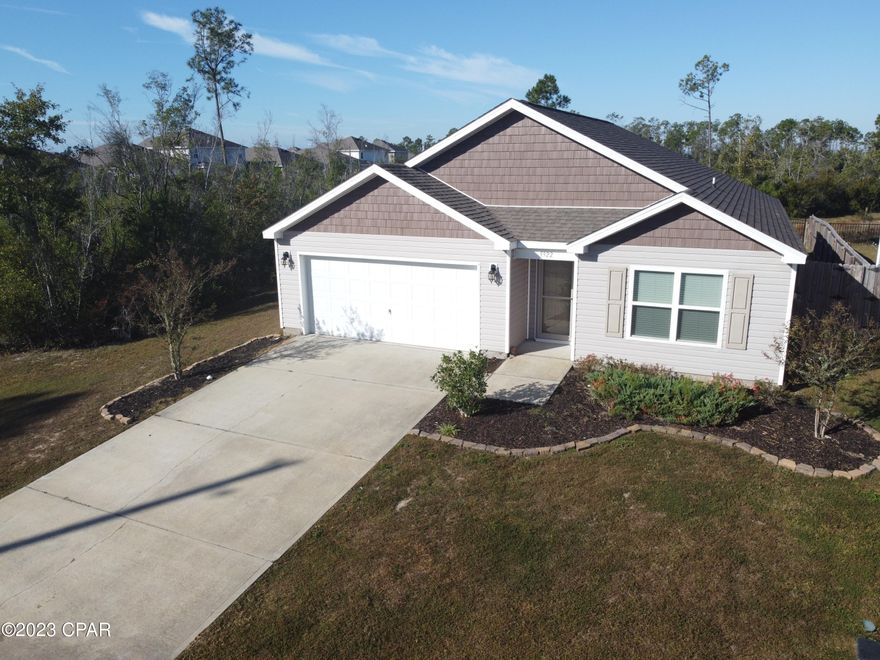 Open House this Sunday (11/12) from 1pm to 3pm. A beautiful 4/2 in the desirable Olde Towne Village Community. This popular ''Cali'' is an amazing floor plan with an open concept in the main spaces and split design for the master. Luxury vinyl plank throughout with carpet in the bedrooms. The kitchen has an island with a bar and a spacious pantry. Plenty of cabinets and counter space. Master suite features double vanities, garden tub, and separate shower. Walk-in closet is in the bathroom for added convenience. All guest rooms are nice sized. Dining space leads to a covered patio. Back yard is completely fenced with privacy fencing on the sides and a rod iron fence across the back to give you views of the pond to watch the ducks and turtles. A private feel with only a neighbor on the right side. 2 car garage. Well established community with great proximity to TAFB. Schedule your visit today!