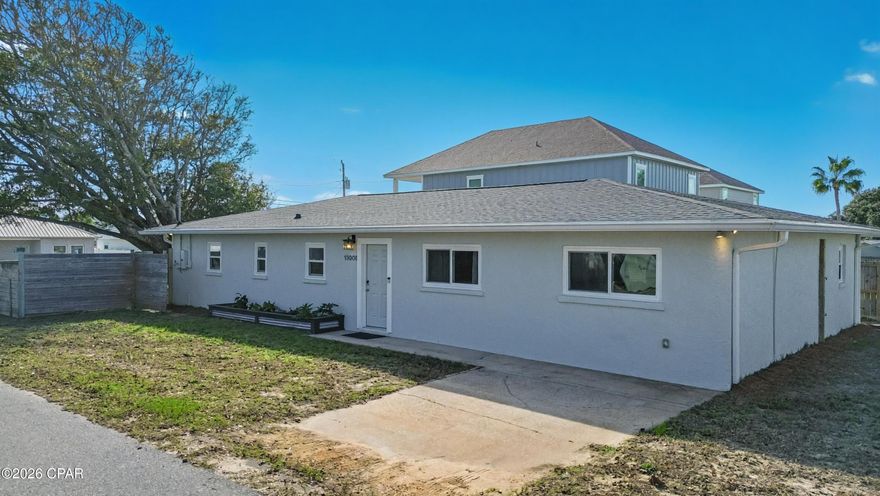 Experience the ultimate beach lifestyle at this spacious 4-bedroom, 2-bathroom rental located in the heart of Laguna Beach, just two blocks from the sandy shores with direct beach access. Perfectly positioned between the excitement of Pier Park and 30A, this 1,724-square-foot home sits on a rare double corner lot, with abundant off-street parking for multiple vehicles, camper, or even an RV! The single-story interior features an inviting open floor plan with solid pour terrazzo floors throughout and a brand new kitchen (Pictures coming soon), updated bathrooms and plenty of storage! Outside, a privacy fence and a massive oak tree create a relaxing retreat in a golf-cart-friendly neighborhood where you are within walking distance to local favorites like Thomas Donuts and The Carousel, making this the perfect blend of space, comfort, and coastal convenience. Schedule your showing today!