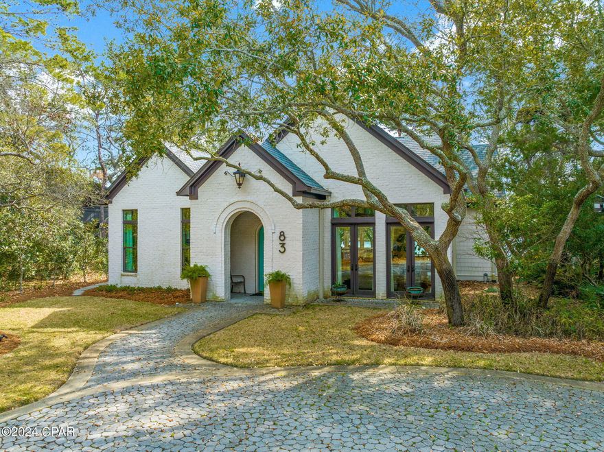 'CURRENTLY UNDER CONTRACT, SELLER WILL CONSIDER BACKUP OFFERS'This pristine four-bedroom brick home offers a superb living experience in a picturesque lake front setting. Situated on a high lot overlooking Eastern Lake with 85 feet of frontage, it provides easy access to the Gulf of Mexico, either by a short paddle or a leisurely stroll. The custom multi-tiered decking enhances the outdoor living experience, creating a peaceful and beautiful environment to enjoy scenic Eastern Lake. The expansive windows in the kitchen and living areas showcase breathtaking views of Eastern Lake, framed by the unique oaks that surround the property. The house boasts a dream kitchen that is sure to delight any culinary enthusiast and is a focal point of luxury, featuring high-end appliances such as a Wolf stove, Sub-Zero refrigerator, and an Asko dishwasher. Custom-made Kraft cabinetry with automatic closures adds a touch of sophistication. The gourmet kitchen is designed for both functionality and style, providing an ideal space for cooking and entertaining.

The 1st-floor master bedroom is a tranquil retreat, complemented by a stunning master bathroom.

On the 2nd floor, there is another master suite with a private balcony, providing an additional vantage point to enjoy the scenic surroundings. Two more bedrooms on the second floor ensure ample space for family or guests.

This excellently maintained home is versatile and well-suited for various purposes, whether as a full-time residence, a vacation home, or a rental property. Its sophisticated design, high-quality amenities, and a perfect location makes it unique and ideal for a 30A Dune Lake Home. *Home is buying sold furnished including all the lake toys under the deck. Seller is removing their personal items and a few pieces of artwork and furniture. List of items excluded from sale will be provided.  Buyer to verify all information and measurements deemed important.