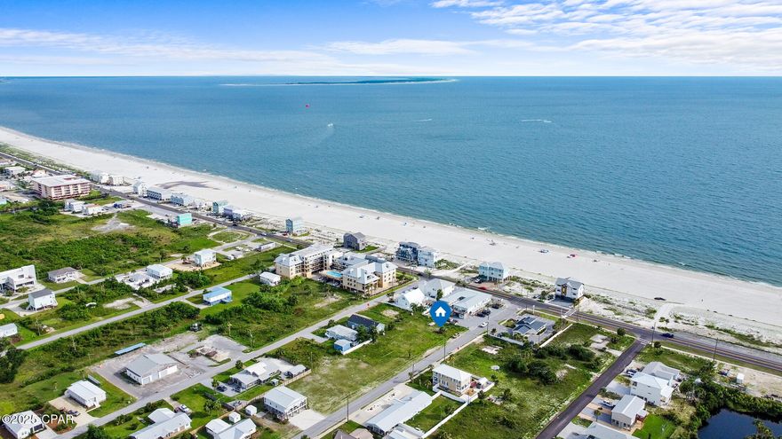 Welcome to an exceptional opportunity to own a prime vacant lot at 104 15th St, Mexico Beach, FL. This property is ideally situated approximately 75 feet from beach access, offering stunning Gulf views and the potential to create your dream coastal retreat. Whether you envision a luxurious private residence or a lucrative short-term rental, this lot provides the perfect canvas for your vision.

The lot is available for purchase outright or with a unique option to utilize a set of meticulously designed plans, crafted to maximize the potential of this remarkable location. The plans feature a spacious 3,456 square feet of heated and cooled living space, accommodating 4 bedrooms and 3 1/2 bathrooms. This design offers flexibility on the first floor, accommodating a two-car garage with an additional storage or bonus area for a game room. The foyer on the first floor is open to the ceiling of the third floor, enhancing the sense of space and light.

The plans include 10-foot ceilings on the first level, 12-foot ceilings on the second floor, and 10-foot as well as vaulted ceilings on the third floor. designed for exceptional views of the Gulf. The home is designed for easy accessibility to all floors by stairs or elevator, and also features a vent less fireplace and an oversized porch with an outdoor kitchen off the second floor. A spiral staircase leads to an observatory deck on the rooftop, promising breathtaking panoramic views of the Gulf.

A significant advantage of this offering is the collaboration with the owner/builder, who is available to construct the home at cost plus, should the buyer choose to proceed with the provided plans. This arrangement ensures an efficient building process tailored to your specifications. Additionally, a realistic AI version is available for better visualization of the house plans, aiding in the decision-making process.

For those seeking additional amenities, the lot offers ample space to incorporate a small pool in the backyard, further elevating the property's appeal. This feature enhances the potential for creating a serene oasis, perfect for relaxation and entertainment.

Mexico Beach is renowned for its pristine beaches and vibrant community, making it a sought-after destination for both residents and visitors. The location of this property offers easy access to local attractions, dining, and recreational activities, ensuring a balanced lifestyle of tranquility and convenience.

This listing is a rare opportunity to secure a piece of paradise with the flexibility to customize according to your desires. Whether you choose to build your ideal Gulf view home or capitalize on the area's rental market, 104 15th St presents endless possibilities. Contact us today to explore this unique offering and take the first step towards realizing your coastal living dreams.