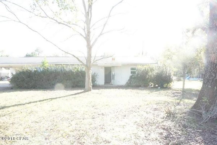 Block home with 3 bedrooms and 2 baths, large family room or dining room on almost 1/2 acre lot with a nice shed for storage and a carport to park the car. Open living room, appears to have a newer roof, nice size laundry room and more   Won't take much to make this one your own.  Call today to see.