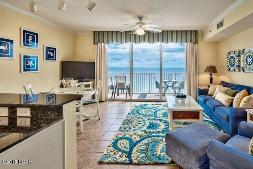Imagine watching the dolphins play and enjoying sizzling sunsets from your expansive 18' wide gulf front balcony. This prime, 12th floor condo with an adjacent, assigned medium sized 

(2'x 9') storage unit ($7,000 cost) has been meticulously maintained and features a comfortable floor plan with two spacious bedrooms, three full baths plus bunk room area. Located in the highly desirable '13 stack', this unit has an unobstructed rear view of a freshwater lake and Pier Park. It is being sold as a turnkey rental investment with 6 years of incredibly strong rental history grossing over $44,100 annually! Owner is willing to transfer rent-by-owner knowledge and assets to buyer. It is professionally decorated in a relaxed 'coastal living' decor with upgraded light fixtures, custom upholstered furnishings that were redone in 2013, Sealy Posterpedic mattresses, a side x side refrigerator with ice and water purchased in 2014, ResortLock keypad lock, custom draperies with black-out lining, porcelain tiled floors thru out the main living area, kitchen and baths and  new laminate wood floors in the hallway and bedrooms that keeps the condo cool and allergen free. The condo was freshly repainted in January, 2015. Tidewater Beach Resort is ideally located at the West end of Panama City Beach close to the new airport and less than 1/4 mile from Pier Park with hundreds of shops, restaurants plus entertainment. The wonderful resort amenities include two outdoor gulf front pools plus an indoor heated pool, two game rooms, restaurant, convenient store, a huge state of the art beachfront fitness center, 70 seat  movie theater, 4 hot tubs, saunas, steam rooms, conference room,  covered parking, a computer lounge, library/game area, a top floor owner's lounge, beach chair service, large deck with Starbucks coffee shop and 636 feet of pristine beach frontage.  Don't miss out on this one!
