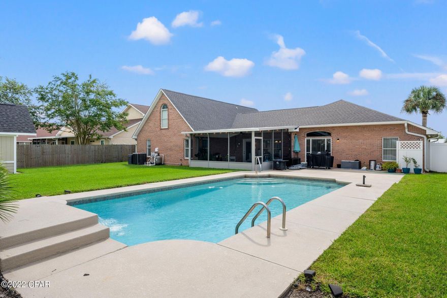 Beautifully updated brick home in highly sought after Candlewick Acres with NO HOA. This recently renovated home has quartz countertops, stainless steel appliances, recessed lighting, updated flooring, paint and so much more. New roof and HVAC installed in 2020 and a spacious screened in porch was completed in 2021. This 5 bedroom, 3 bathroom home provides plenty of room for your family to grow and share lasting memories. Spend relaxing afternoons enjoying the serene saltwater pool with a waterfall in your private fenced in backyard. A double car garage allows for storage of larger vehicles and toys. In addition, an 8x12 yard building provides even more storage for lawn and garden tools. *Buyer to verify all measurements, if important. Located in Flood Zone X.