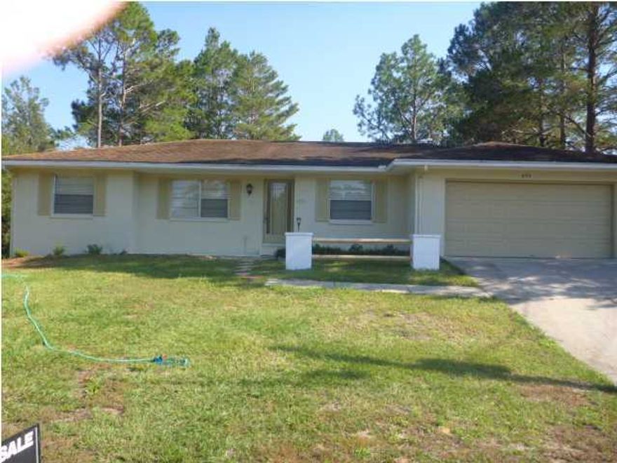 Large home in Sunny Hills Subdivision, near Boat Lake, yard building, 2 car garage with electric door opener, split bedroom floor plan, large family room, on newly paved street. This community offers fresh water lakes for fishing, boating and swimming, picnic areas, community center, parks, churches, 27 hole golf course, tennis courts, country setting only 30 minutes to Panama City and convenient ot I-10 and the city of Chipley. All offers to be written ''AS IS''