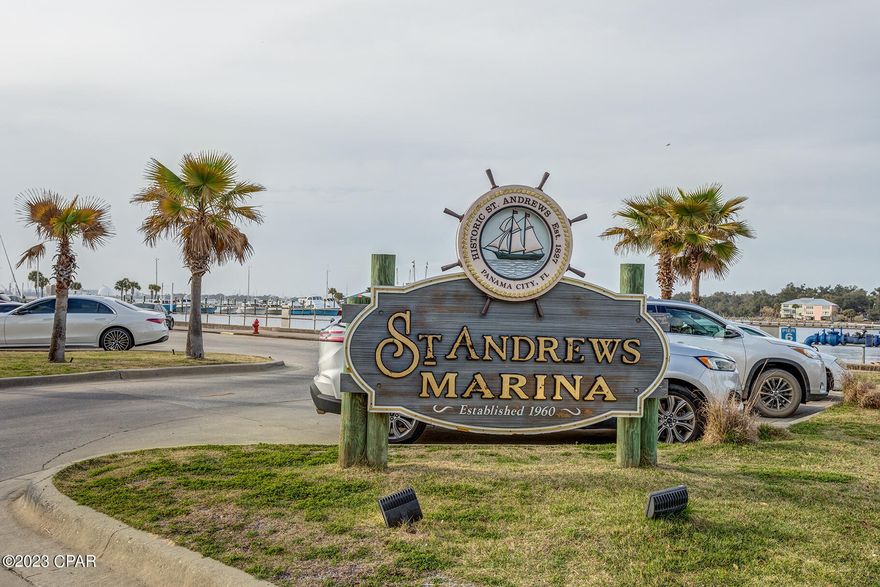 Bay front Harbour Village at Historic St. Andrews 2-bedroom, 2 & 1/2-bathroom luxury condo. This is a High end Building with many amenities including a heated waterfront pool, a fitness center a grand clubhouse and covered parking to name a few.  Grand Views of St Andrews Bay From Master bedroom, and main living spaces. This unit has all new solid wood floors in the living, dining room and kitchen and newer carpet in the bedrooms.  The kitchen has solid wood cabinets, granite countertops, and lots of storage.  Living room has a cozy gas fireplace, and is bright and airy with lots of windows that let in tons of natural light.  Both bedrooms have their own ensuite, with the Master having a double vanity and a separate shower and soaker tub. Located right in historical downtown St.Andrews.