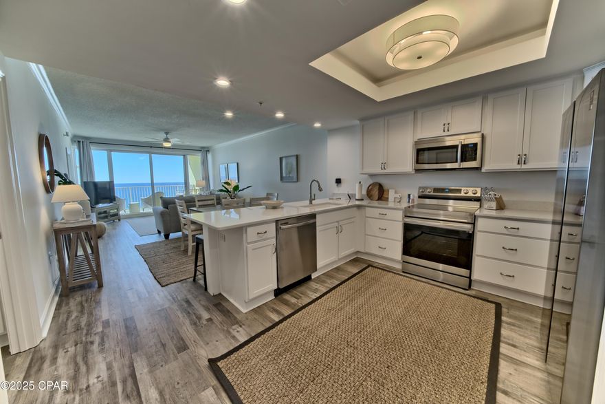 Enjoy stunning views of the Gulf of Mexico from this beautifully remodeled 2-bedroom, 2-bath gulf-front condo located on the 14th floor of Boardwalk Beach Resort. Situated on one of the largest private beaches in Panama City Beach, this property offers direct beach access and exceptional resort amenities.

This spacious condo comfortably accommodates up to eight guests and features luxury vinyl flooring, quartz countertops, new kitchen cabinets and appliances, updated lighting, fresh paint, and new furniture throughout. The open-concept living and dining area includes a table for six and a breakfast bar with seating for four. The kitchen is fully equipped for convenience and functionality.

The master suite offers spectacular Gulf views, a king bed, and an ensuite bath with a jacuzzi tub and separate shower. Additional features include a queen sleeper sofa, a private balcony overlooking the beach, and a laundry room with a washer and dryer.

Boardwalk Beach Resort amenities include a beachfront pool and hot tub, the popular ''Splash Zone'' for kids, a beachfront bar and grill, and a fitness center with Gulf views.

This property presents an excellent opportunity for short-term rental income or personal vacation use. With its modern upgrades, desirable location, and resort-style amenities, this gulf-front condo is a must-see along Panama City Beach's Emerald Coast.  This property is turn-key and already on a popular rental management program.