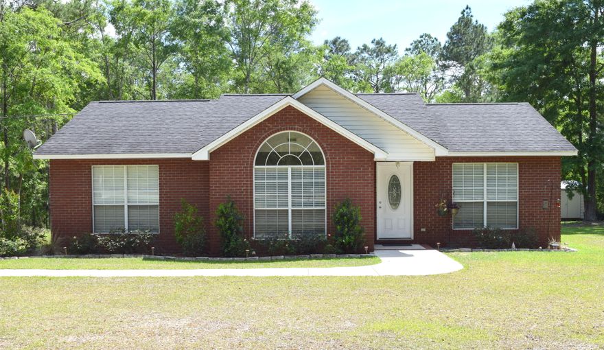 THIS CUSTOM BRICK HOME IS LOCATED IN THE HIGHLY DESIRABLE NEARING HILLS SUBDIVISION AND BOAST A SPLIT FLOOR PLAN, MASTER SUITE WITH WALK-IN CLOSET, LAMINATE/TILE FLOORING THROUGHOUT, EAT IN KITCEN WITH MOBILE ISLAND AND SPACIOUS UTILITY ROOM. OUTSIDE FEATURES INCLUDE OVERSIZED PARKING PAD WITH WALKWAY, LANDSCAPING, LARGE BACK PORCH AND A 24X20 STORAGE SHED. HOUSE SITS ON A 1.28 +/- ACRE LOT WITHIN 2 MILES OF INTERSTATE 10, SHOPPING, SCHOOLS AND RESTAURANTS.