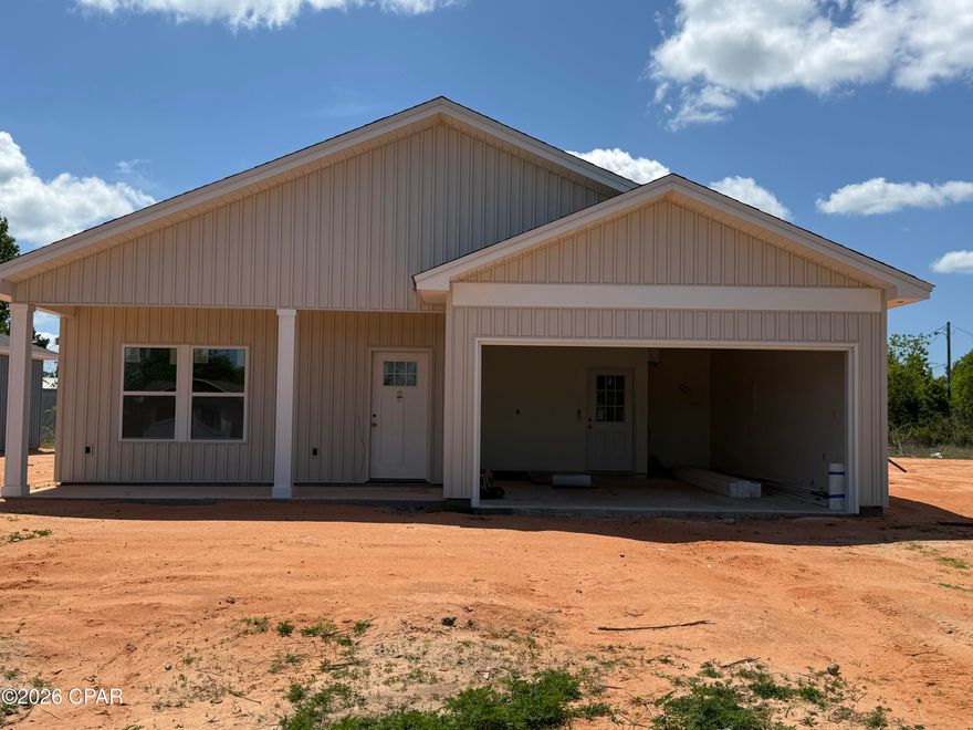 Under construction and nearly ready to impress! This brand-new 3-bedroom, 2-bath home is ideally located in Panama City. Designed with modern living in mind, the home features 9-foot ceilings and luxury vinyl plank flooring throughout, creating a bright and open feel. The open-concept living, dining, and kitchen areas flow effortlessly, making the space ideal for both everyday living and entertaining. The kitchen boasts granite countertops, stainless steel appliances, and a pantry, all overlooking the main living area. Tucked away for privacy, the primary suite offers a peaceful retreat with a double vanity, walk-in shower, and spacious walk-in closet. Two guest bedrooms share a full bath with a tub/shower combination. A convenient mudroom with garage access is located just off the kitchen, providing added storage and functionality. Also, FPL is currently installing underground power for Douglas Road and it should be completed this year.  Don't miss the opportunity to own a beautiful new construction home in a desirable location.