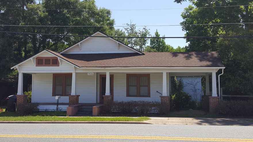 Spacious Old Florida Home situated on a lot that is also zoned commercial.  This property could be a great location for a business right downtown Blountstown!  The possibilities are many with this fixer upper.  Make it a renewed home with your touches or a home for your business!
