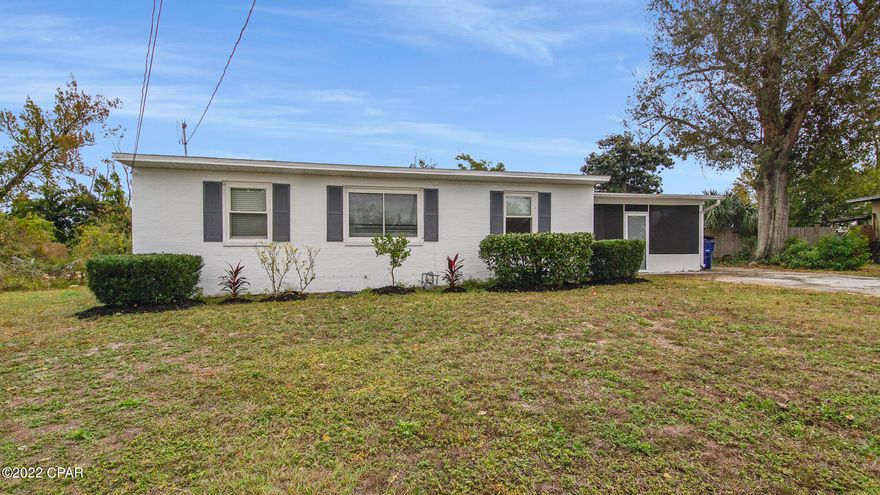 Check out this Charming 3 bedroom home centrally located in Panama City, near shops, restaurants, fast food, hospitals and a short distance from Panama City Beach. The home has new light grey interior paint, new LVP Flooring throughout, new light fixtures and updated stainless steel appliances in Kitchen. The home has a functional layout and with a bonus room directly off the kitchen offers a space for additional seating or a formal dining area. As you step into the screened in porch, you will find a great area for hosting football parties or entertaining friends and family for the holidays or a barbecue. The backyard is completely fenced in and offers a lovely deck just waiting on some outdoor furniture to enjoy the Florida sunshine. The home sits on .4 acre lot.