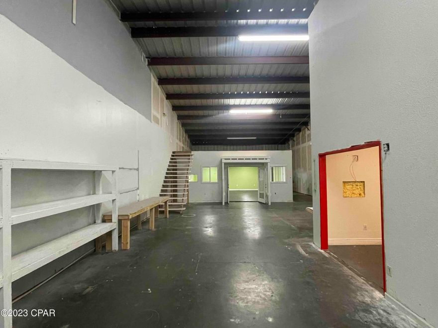 INDUSTRIAL WAREHOUSE AVAILABLE FOR LEASE in PANAMA CITY BEACH.  3,000 sf warehouse with office space and one bathroom.  Unit 340 includes one 12'x12' overhead roll up door and one office door.  The office and some of the flex space are air conditioned.  The unit has built-in shelving on one side of the warehouse.  Base rent is $10.50/sf and CAM is $2.59/sf or $3,272/month and a 6.5% sales tax.  Unit will be available on May 1st, 2023.