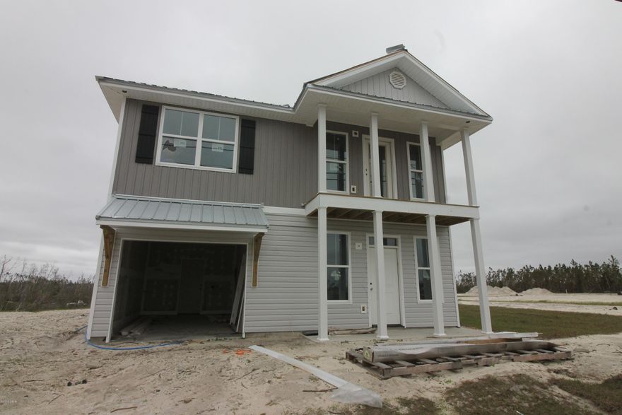 Beautiful New homes in a new community close to Tyndall AFB. This home is built with energy savings in mind. Metal Roofs, Custom cabinets, Quartz counter tops, tile, carpet in upstairs. This is one you don't want to miss. Perfect Location and the price is right