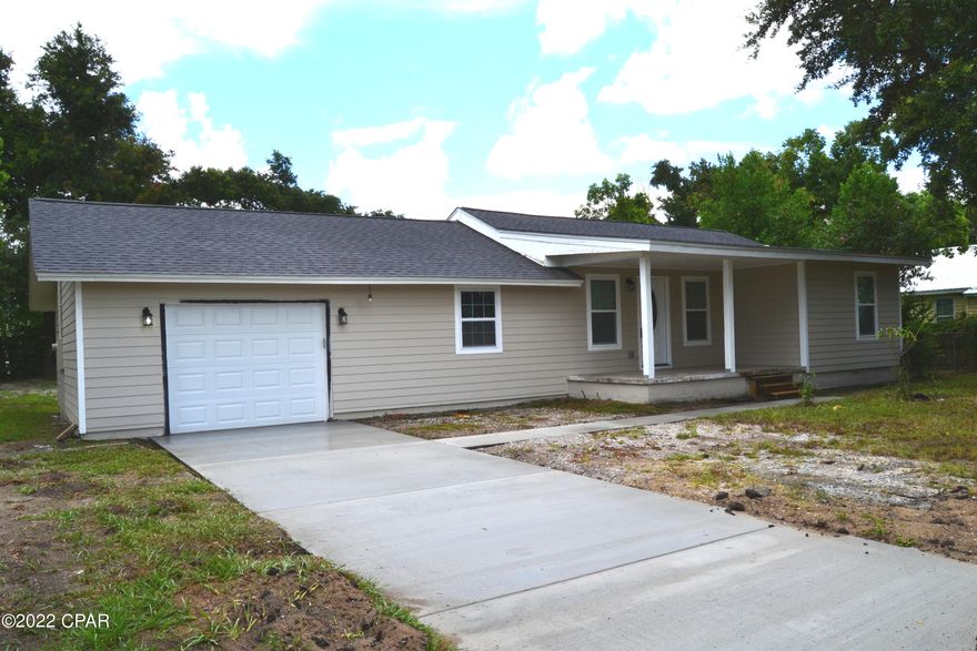 CURRENTLY UNDER CONTRACT, SELLER WILL CONSIDER BACKUP OFFERS.  Completely renovated and ready to move in!  This 3 bedroom, 2 bath home is all new inside and out. The roof and exterior siding are all new and the interior of the home has all new flooring, water heater, HVAC, appliances, cabinets and countertops. The open concept makes the home feel much larger than it is and the split bedroom plan allows maximum privacy.  Both bathrooms are renovated too!   A one car garage and new drive way provide plenty of off street parking and the HUGE yard is perfect for your retreat from the world.   Come see this one today! Hard to find at this price.