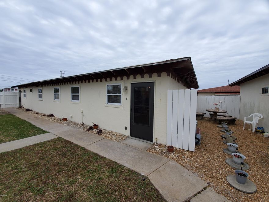 For rent. 2 Bedroom, 1 bath town home located within a short walk to the beach in a quaint New Mexico-style community, Embarcadero. This unit is immaculate with fresh paint, new windows, ceramic tile floors throughout and newly updated kitchen. It has an open concept with the kitchen, dining and living room areas. There is a washer/dryer hookup inside. Outside your front door is plenty of palms to hang your hammock or enjoy a meal outside with a side patio with table. The nicely manicured community features beautiful landscape, a pool, and grill area. Rent includes basic cable, water/sewer, and garbage. Washer/Dryer hookup. No pets. Call us today for your showing!