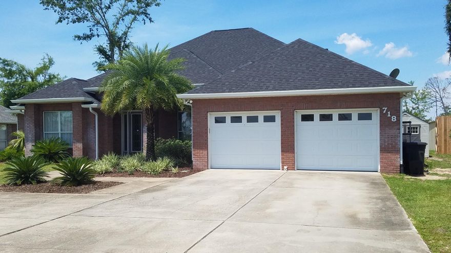 'CURRENTLY UNDER CONTRACT, SELLER ACCEPTING BACKUP OFFERS  This custom-built brick home sits on a half-acre lot on Collage Point featuring 4 bedrooms a bonus room, 3 full bathrooms, a deep in ground pool with an infinity hot tub a brand new gas pool heater and large covered back patio overlooking North bay. You can still enjoy the views from behind the over sized  windows in the living room and the 2 master bedrooms. This home has 10 and 12 foot decorative trey ceilings with crown molding through out this home, built in custom lit shelving, gas fireplace,  bull nose rounded corners throughout the main living area, decorative custom mosaic tile flooring and a wide open floor plan that would be great for large get together's. With 2 additional... Bedrooms there is plenty of room for family and guests